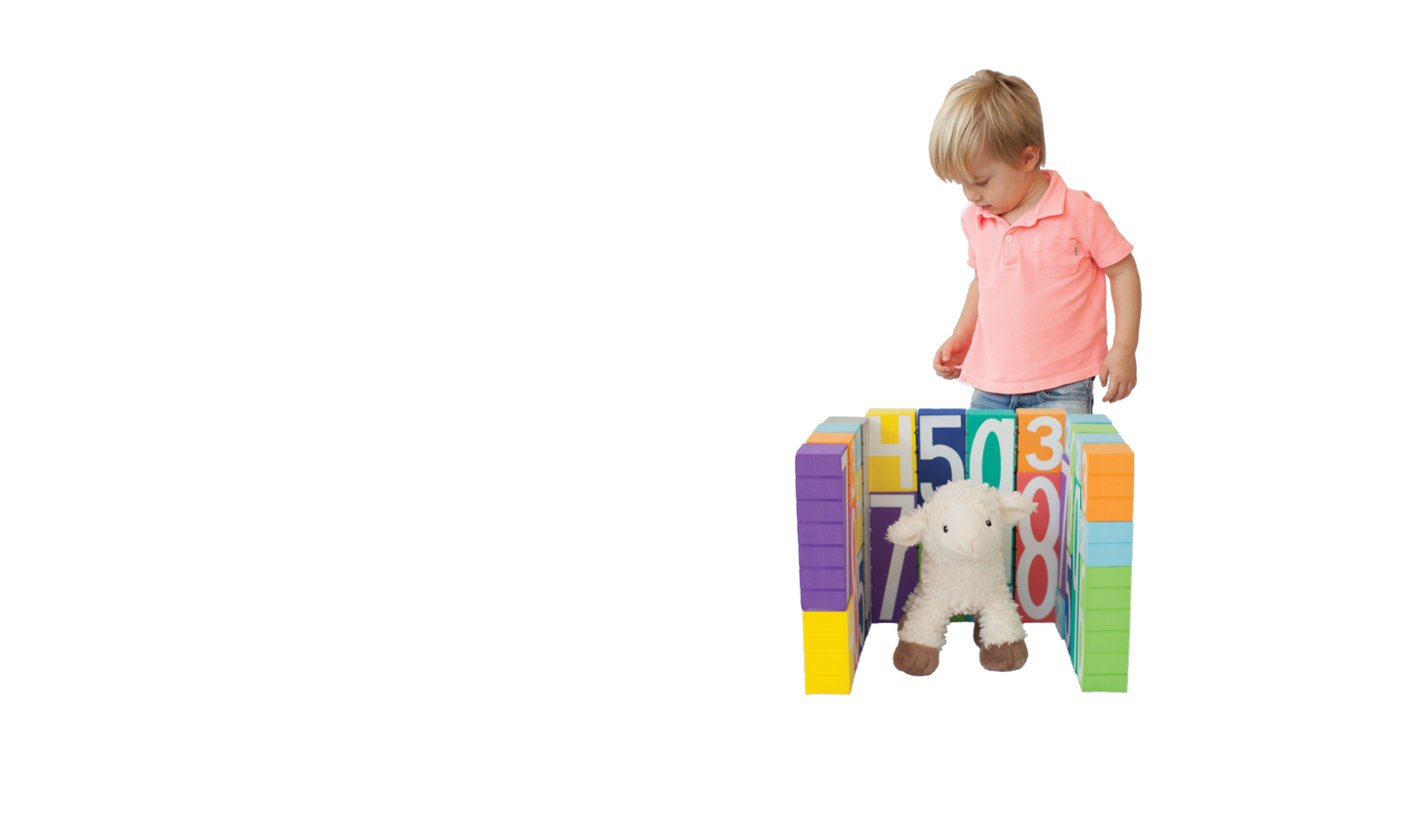 Child playing with a Math Stackers set on a white background